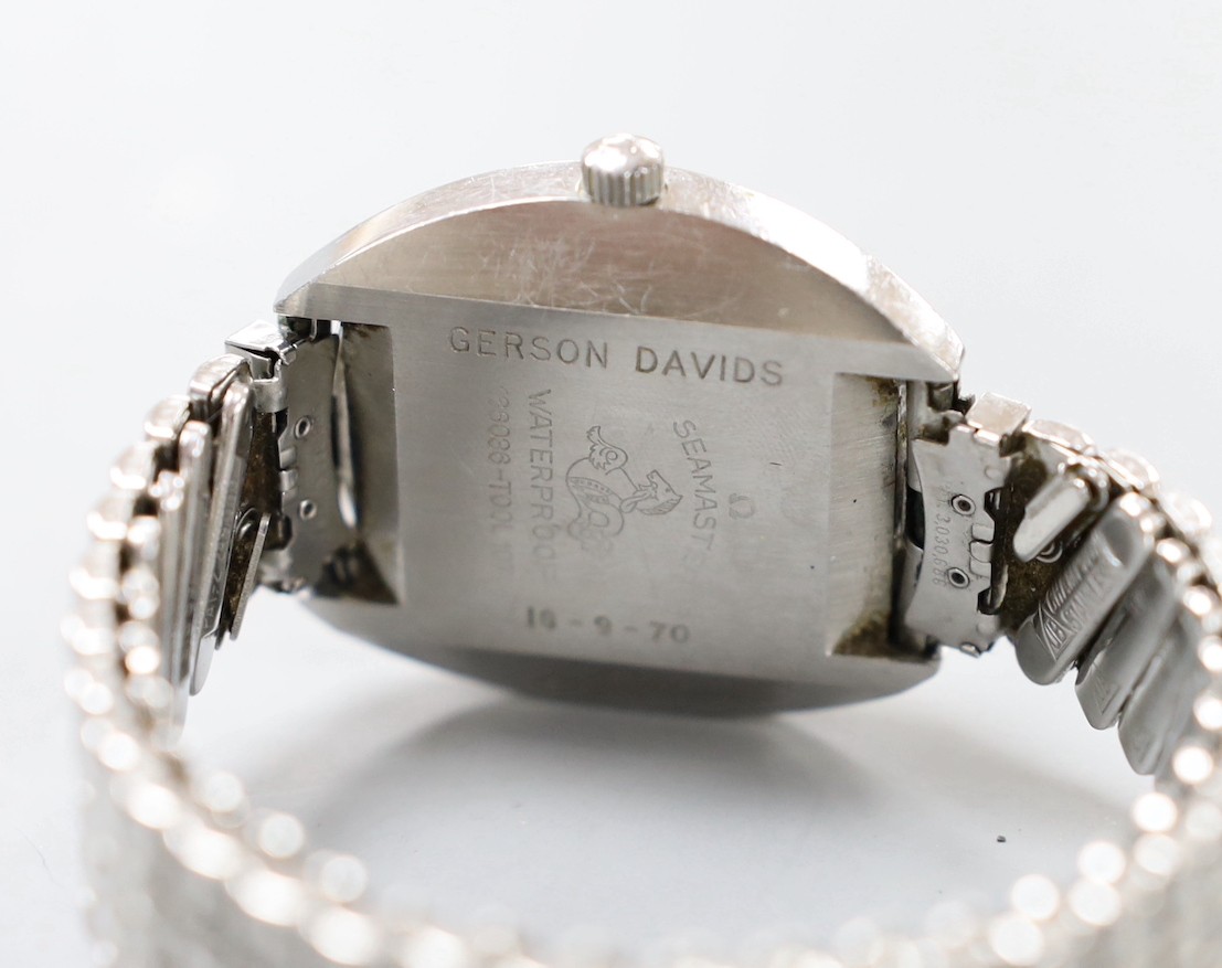 A gentleman's stainless steel Omega Seamaster Cosmic automatic wrist watch, the case back engraved with name and date, on associated flexible bracelet.